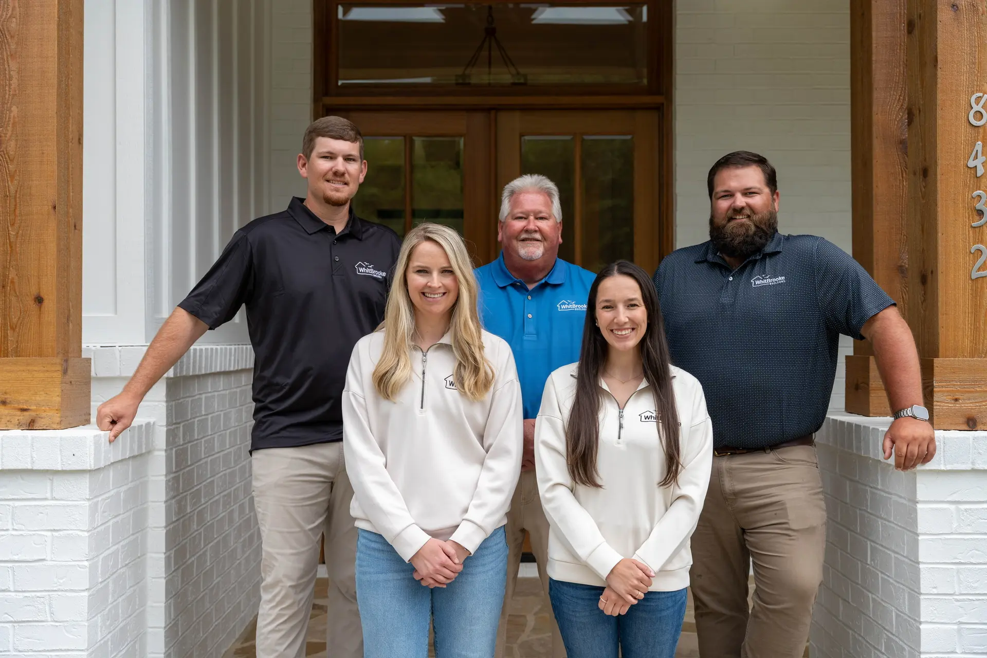 The Griswold family and the WhitBrooke Builders team in Zebulon, NC